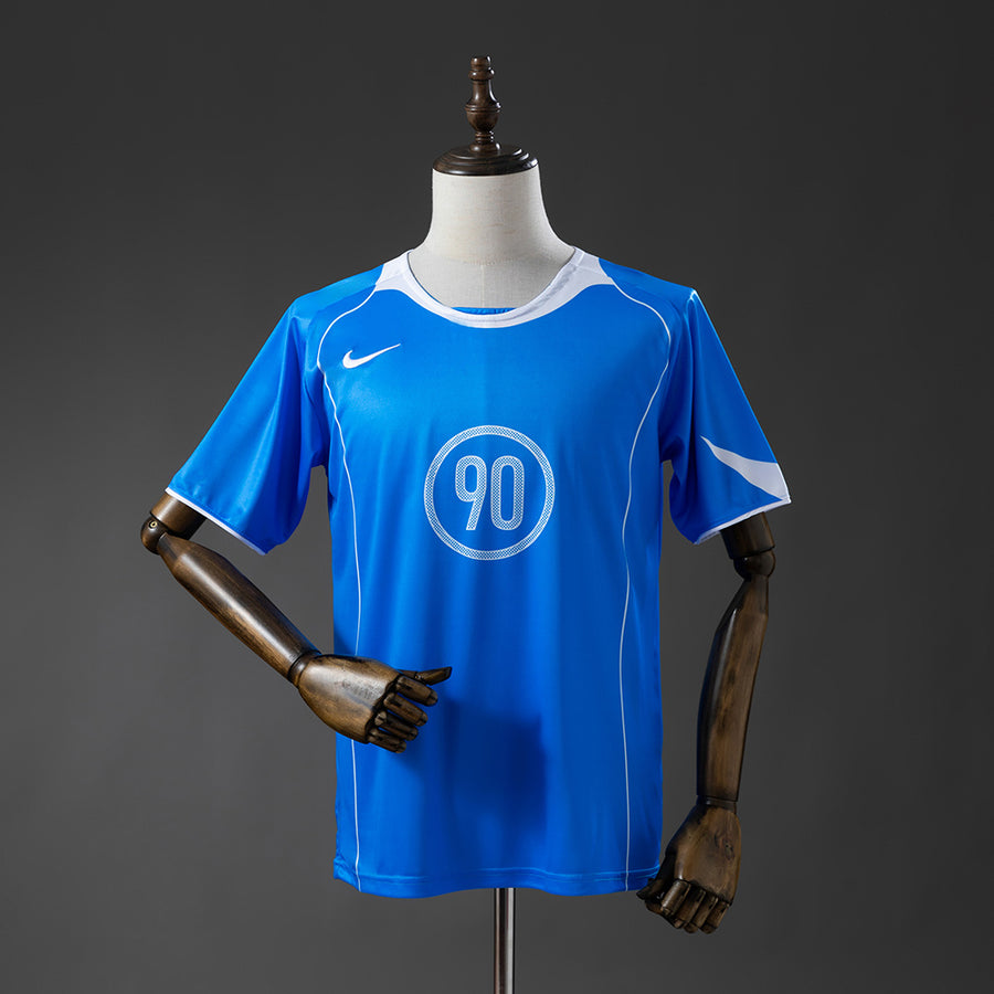 T90 Series - Azul Camisa 2025