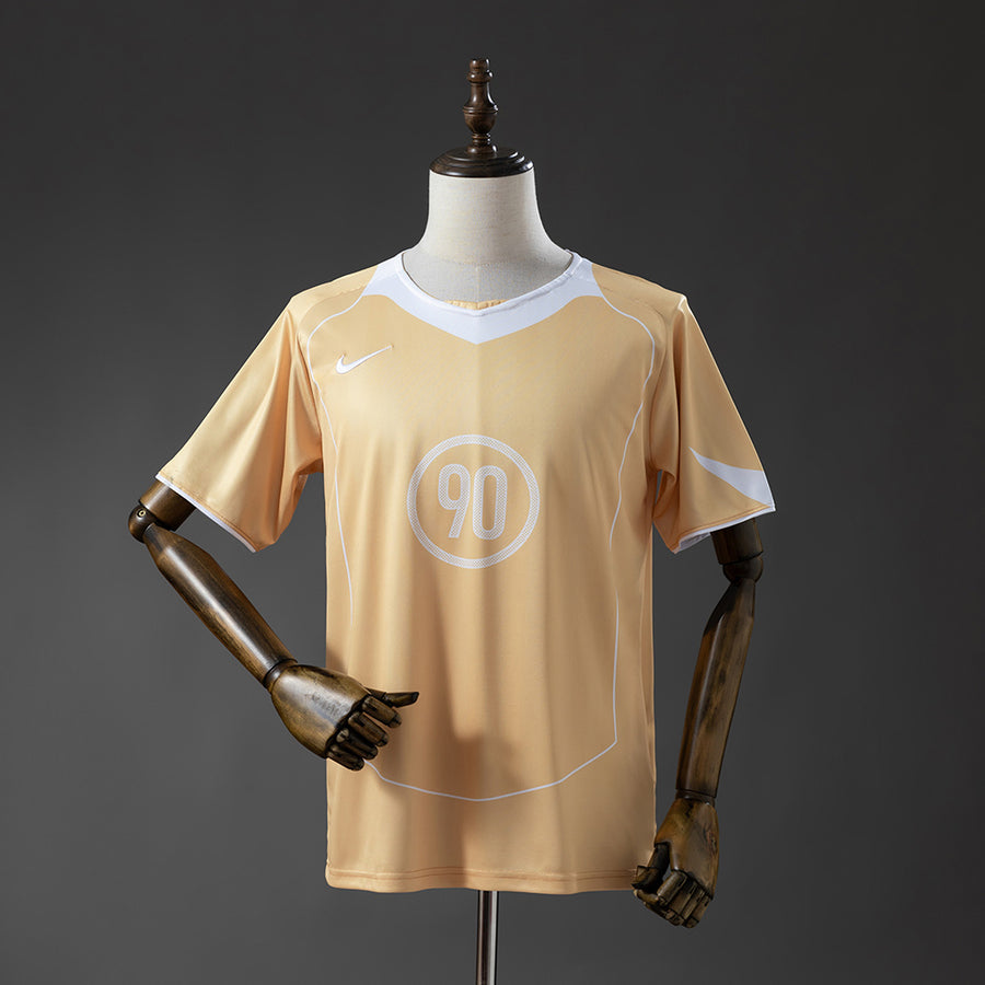 T90 Series - Dourado Camisa 2025