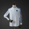 Leeds United Ícones de Arquibancada Branco Manga Longa Camisa